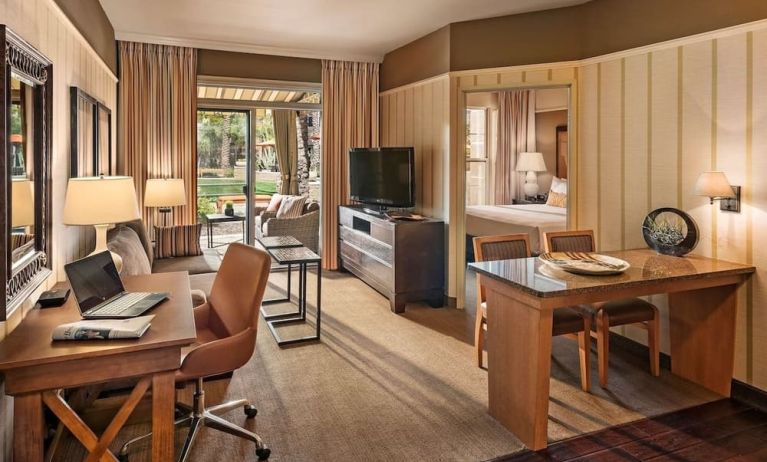 Spacious day room with work station at Sonesta Suites Scottsdale Gainey Ranch.