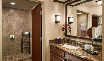 Guest bathroom with shower at Sonesta Suites Scottsdale Gainey Ranch.