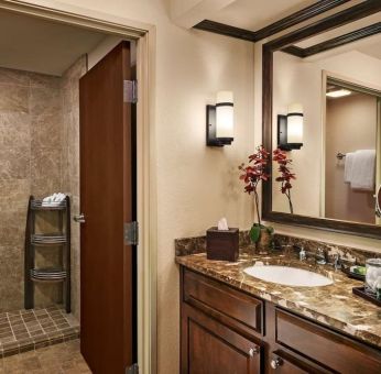 Guest bathroom with shower at Sonesta Suites Scottsdale Gainey Ranch.