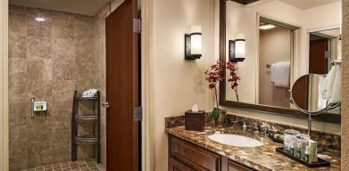 Guest bathroom with shower at Sonesta Suites Scottsdale Gainey Ranch.