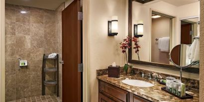 Guest bathroom with shower at Sonesta Suites Scottsdale Gainey Ranch.