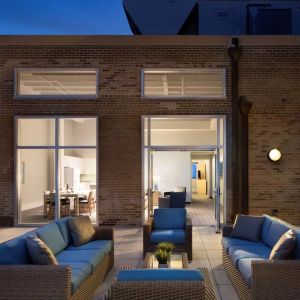 Outdoor lounge and coworking space at Sonesta ES Suites New Orleans.