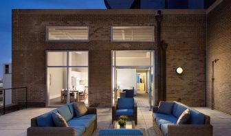 Outdoor lounge and coworking space at Sonesta ES Suites New Orleans.