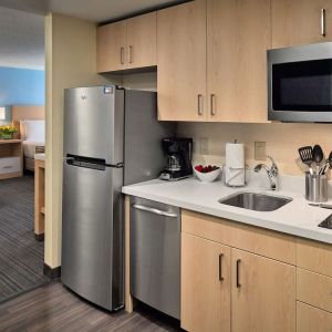 Day room with kitchen at Sonesta ES Suites New Orleans.