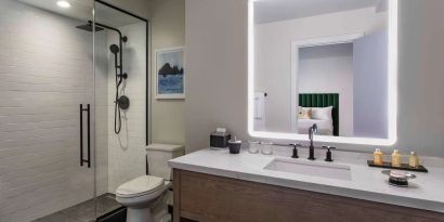 Guest bathroom with shower at Royal Sonesta Chicago Downtown. 