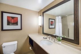 Guest bathroom with shower at Sonesta Los Angeles Airport LAX.