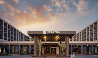 Parking and hotel exterior at Sonesta Redondo Beach & Marina.