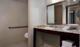 Guest bathroom with shower at Sonesta Redondo Beach & Marina.