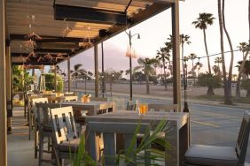 Outdoor eating area at Sonesta Redondo Beach & Marina.