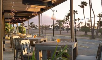 Outdoor eating area at Sonesta Redondo Beach & Marina.