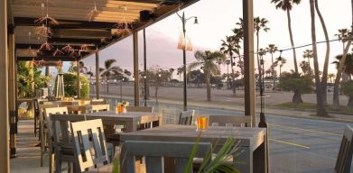 Outdoor eating area at Sonesta Redondo Beach & Marina.