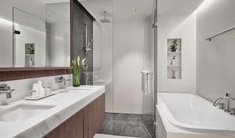 Guest bathroom with shower at Fraser Suites Sukhumvit, Bangkok.