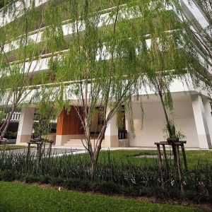 Hotel exterior with garden at Fraser Suites Sukhumvit, Bangkok.