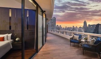 Outdoor terrace with seating area at Fraser Suites Sukhumvit, Bangkok.