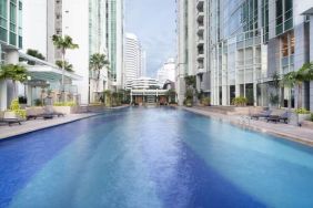 Luxurious outdoor pool at Fraser Residence Sudirman Jakarta.