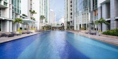 Luxurious outdoor pool at Fraser Residence Sudirman Jakarta.