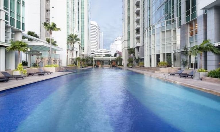 Luxurious outdoor pool at Fraser Residence Sudirman Jakarta.