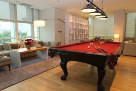 Pool table and game room at Fraser Residence Sudirman Jakarta.