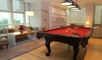 Pool table and game room at Fraser Residence Sudirman Jakarta.