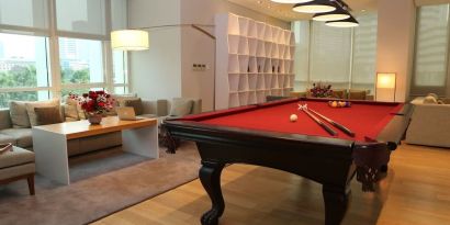 Pool table and game room at Fraser Residence Sudirman Jakarta.