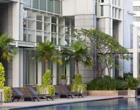 Luxurious outdoor pool at Fraser Residence Sudirman Jakarta.