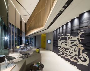 Lobby and lounge area at Modena By Fraser Bangkok.