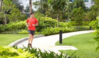 Running outdoors in the garden at Fraser Place Setiabudi Jakarta.