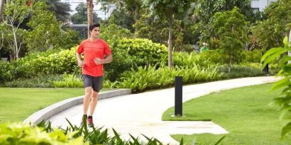 Running outdoors in the garden at Fraser Place Setiabudi Jakarta.