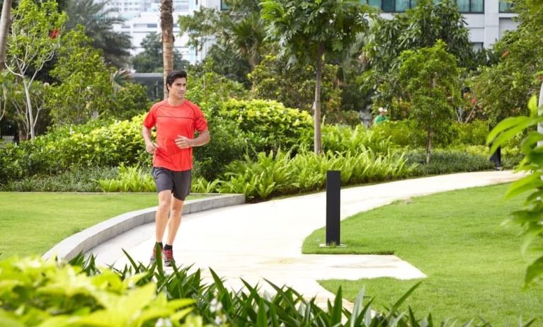 Running outdoors in the garden at Fraser Place Setiabudi Jakarta.