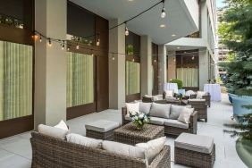 Outdoor terrace and seating area at Sonesta White Plains Downtown.