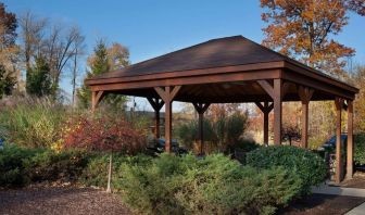 Outdoor terrace and garden at Sonesta Simply Suites Cleveland North Olmsted Airport.