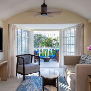 Spacious king room with TV and lounge at Royal Sonesta San Juan.