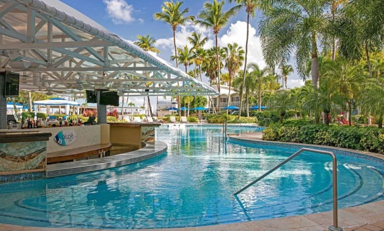 Outdoor pool bar at Royal Sonesta San Juan.