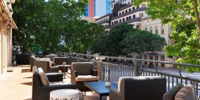 Outdoor terrace at The Stephen F Austin Royal Sonesta Hotel.