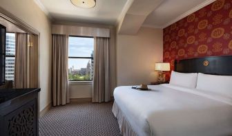 Romantic king room at The Stephen F Austin Royal Sonesta Hotel.