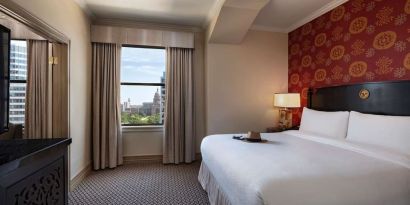 Romantic king room at The Stephen F Austin Royal Sonesta Hotel.