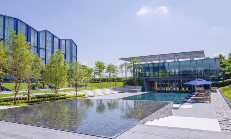 Outdoor pool area at Modena By Fraser Buriram.