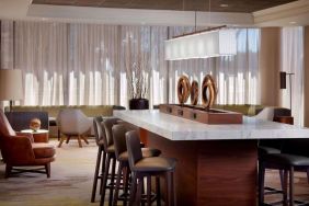 Coworking space and bar area at Sonesta Select Atlanta Cumberland Galleria.
