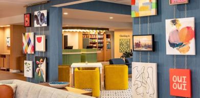 Coworking and lounge area at Sonesta Select Boston Foxborough Mansfield.