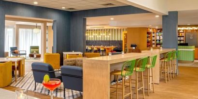 Bar and workspace at Sonesta Select Boston Foxborough Mansfield.