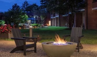 Outdoor seating and fire pit at Sonesta Select Boston Foxborough Mansfield.