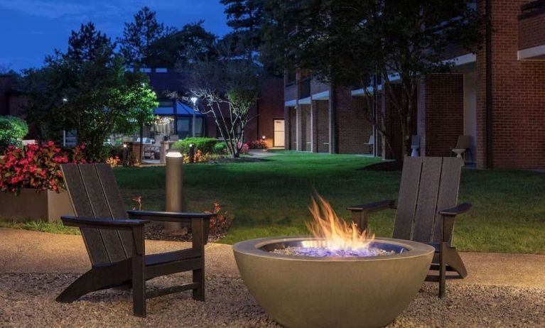 Outdoor seating and fire pit at Sonesta Select Boston Foxborough Mansfield.