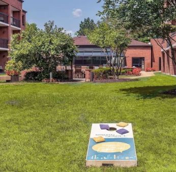 Outdoor garden and yoga space at Sonesta Select Boston Foxborough Mansfield.