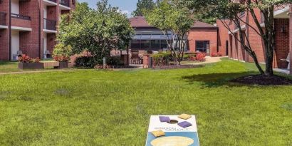 Outdoor garden and yoga space at Sonesta Select Boston Foxborough Mansfield.