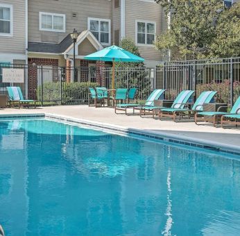 Outdoor pool at Sonesta ES Suites Raleigh Durham Airport Morrisville.