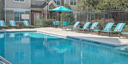 Outdoor pool at Sonesta ES Suites Raleigh Durham Airport Morrisville.