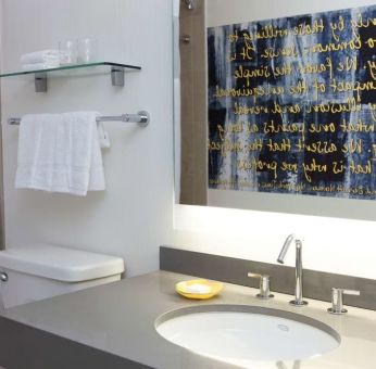 Guest bathroom with shower at The Fifty Sonesta Select New York.