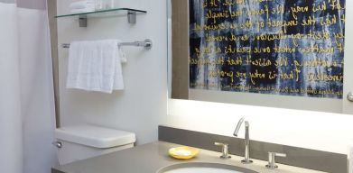 Guest bathroom with shower at The Fifty Sonesta Select New York.