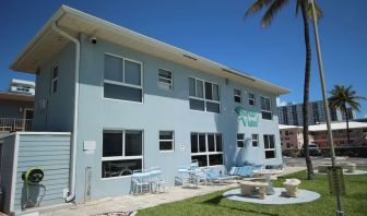 Hotel with lounge chairs at Shore View Hotel.