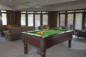 Game room with pool table at DoubleTree By Hilton Oxford Belfry.